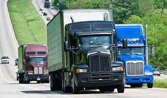 Commercial Trucks Driving on Interstate 
