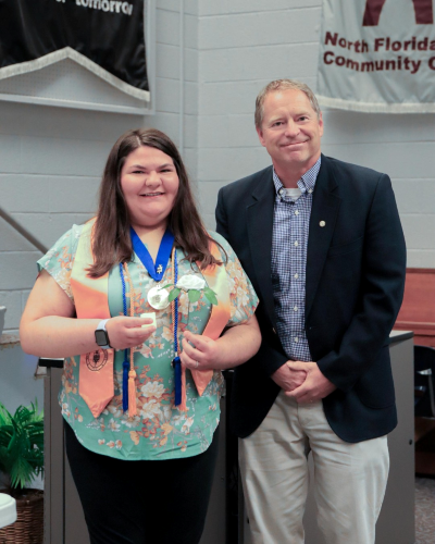 In recognition for her academic excellence Caroline Wynn was inducted into the Phi Theta Kappa Honor Society during its Rose Ceremony